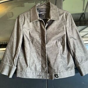Anne Klein size 8 gray jacket 4 button/lap cover buttons.Two buttons bottom.